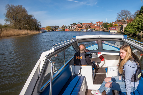 Enjoying a trip on a day boat at Beccles