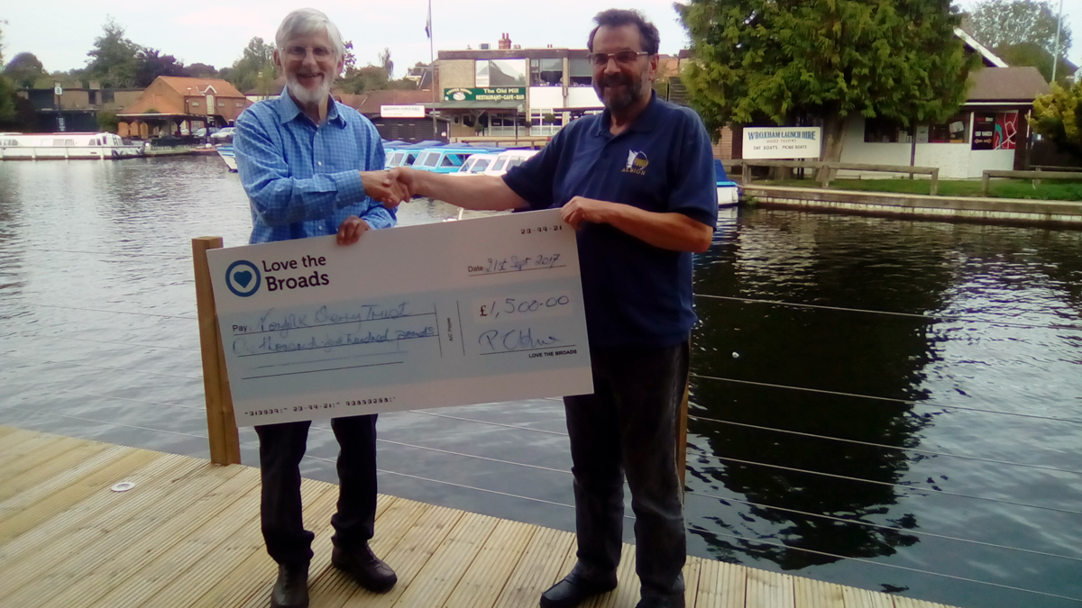 Peter from Love the Broads presenting a cheque to the Norfolk Wherry Trust