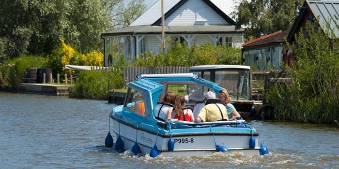 Summer day out on the Norfolk Broads by boat