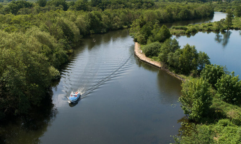 aerial view of day boat on the river