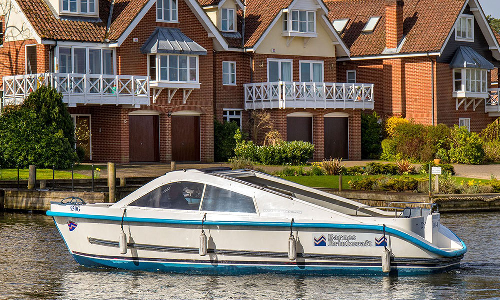 Barnes Brinkcraft self-drive boat leaving Wroxham