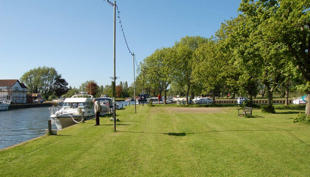 Open grassy area at Beccles Quay beside the Norfolk and Suffolk Broads