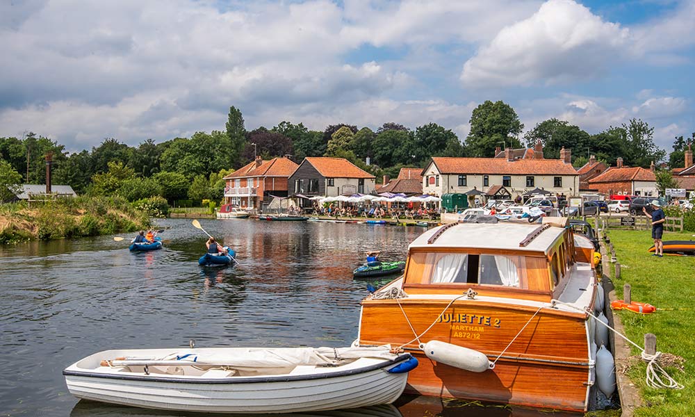 Coltishall common in the Summer, with boats moored