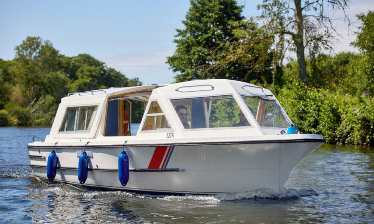 Day boat on the water in the Broads