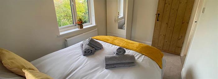 king bedroom at Horstead Cottages