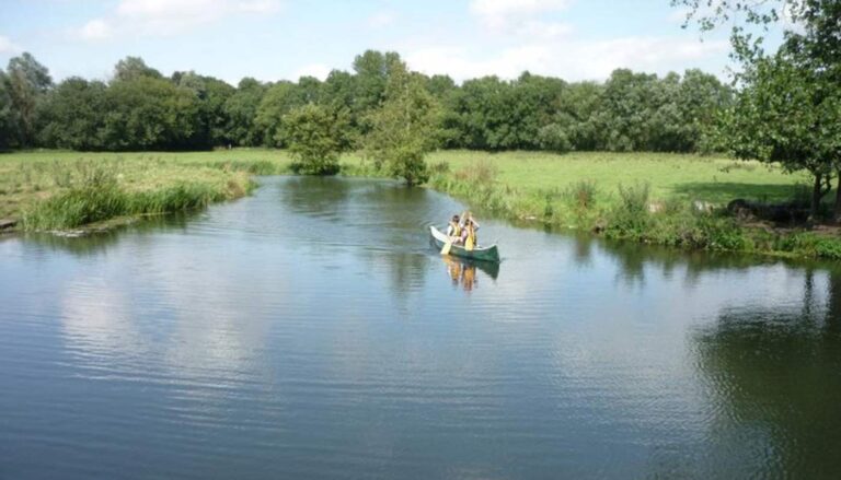 A canoe in nature, peaceful water