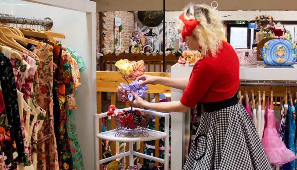 Shoppers browsing unique gifts at Wroxham Barns near Wroxham