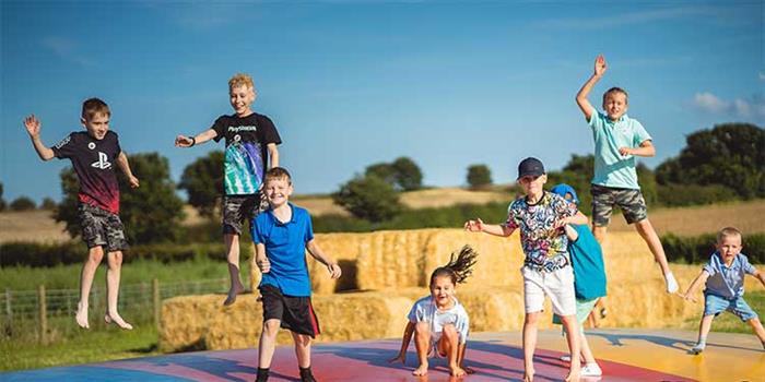 Children exploring maize maze in North Norfolk
