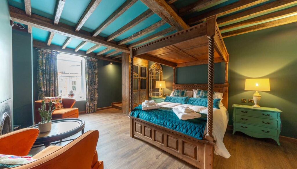 Boutique bedroom with high-end finishes at Ironmongers Hotel