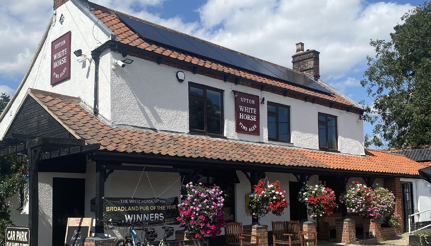 Outside shot of The White Horse pub, on a sunny day