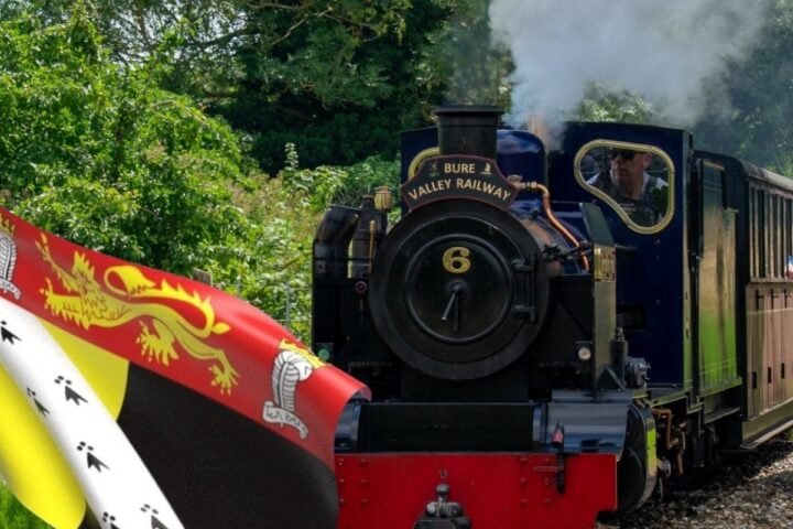 Bure Valley Railway steam train with Norfolk county flag
