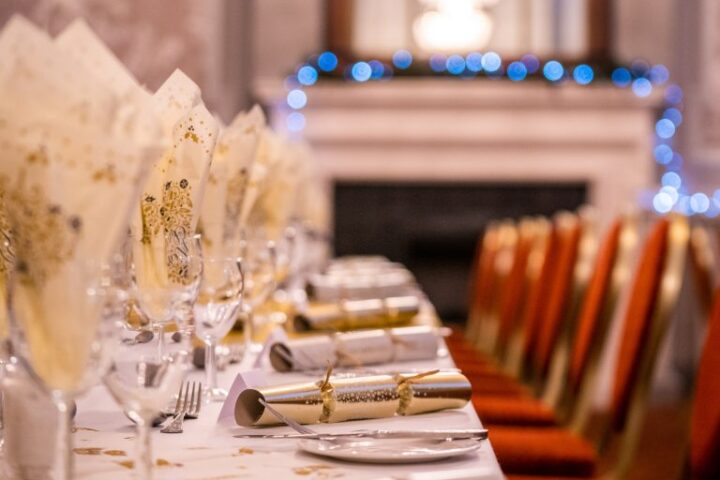 Dining room set up for festive dinner at the Maids Head Hotel