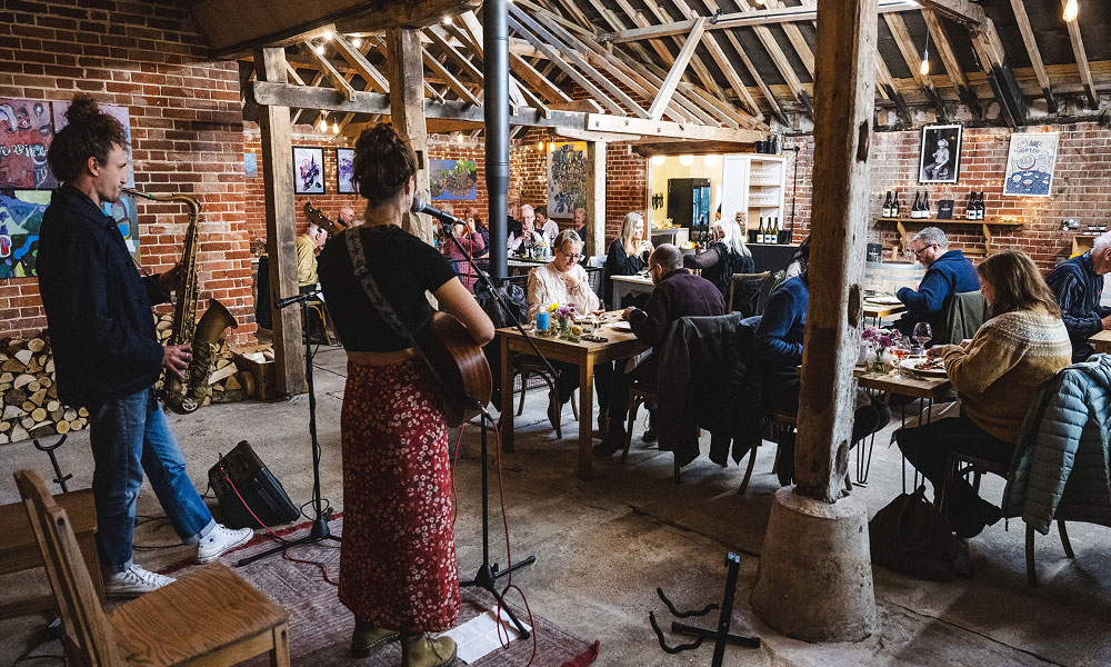 A live band playing in at an event at Flint Vineyard